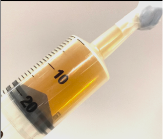 syringe filled with nitrogen dioxide gas equilibrium